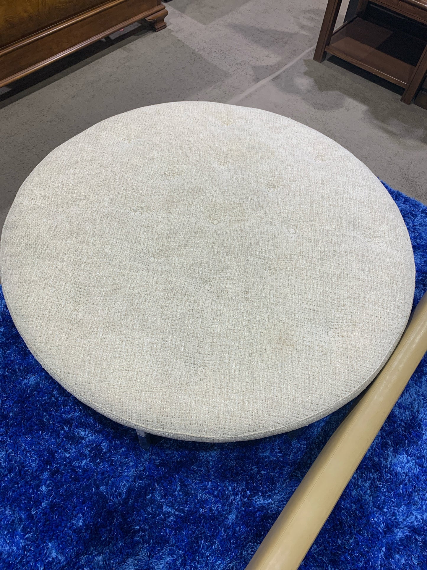 Round Tan Tweed Ottoman